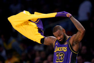 Lakers' LeBron James looks to pass Michael Jordan and break another great player's overwhelming NBA record